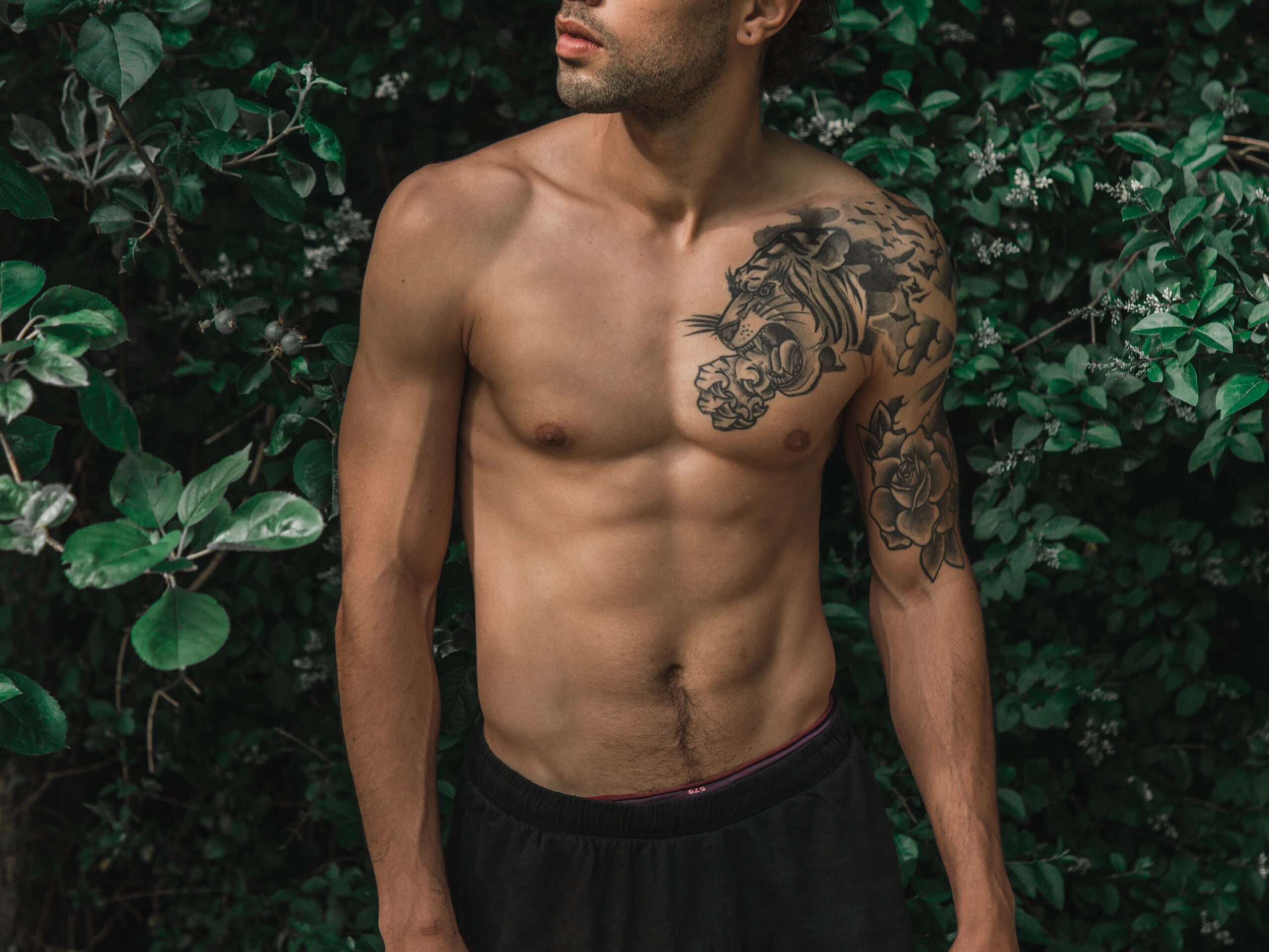 gay shirtless male outdoors thinking about ed and erectile dysfunction that may be psychosamatic related to stress health and not being in the game via Thiago via Pexels